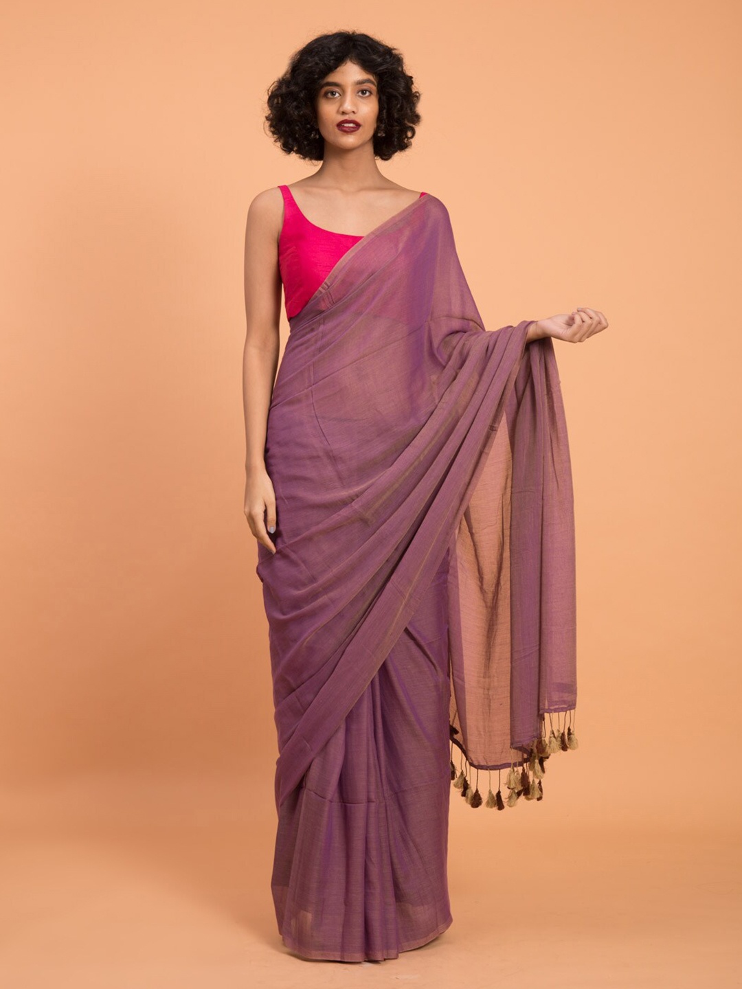 

Suta Lavender Solid Cotton Blend Saree