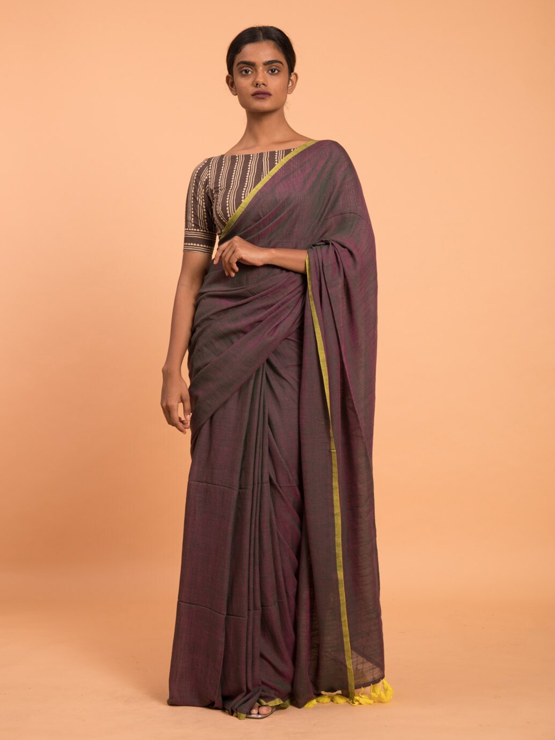

Suta Purple Solid Cotton Blend Saree