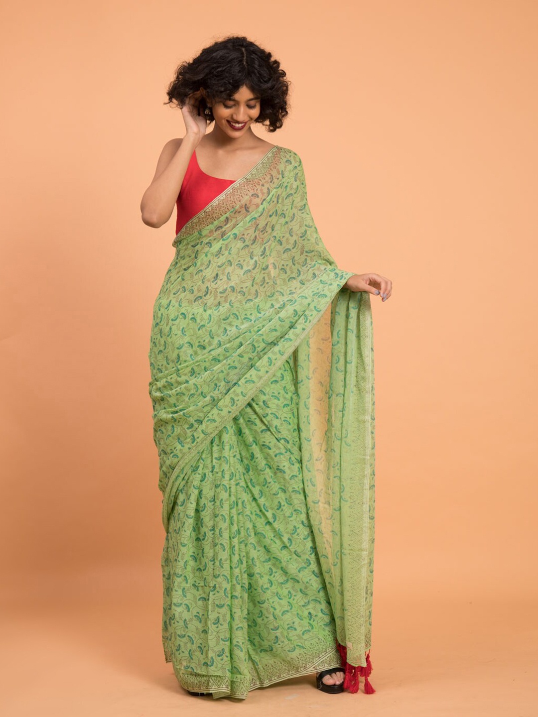 

Suta Green Floral Printed Pure Cotton Saree