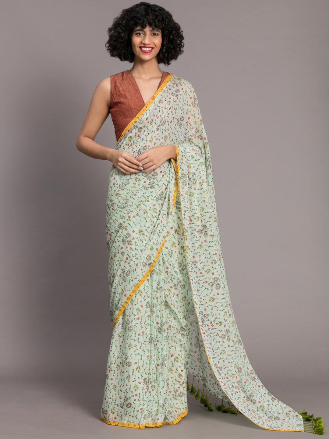 

Suta Green Yellow Floral Handblock Pure Cotton Saree