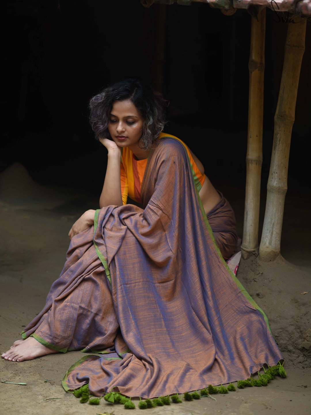 

Suta Brown Green Solid Cotton Blend Saree