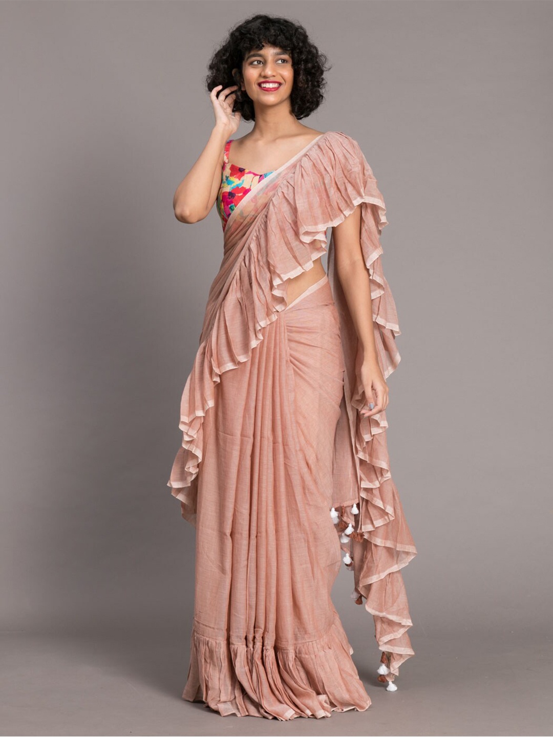

Suta Beige & White Pure Cotton Solid Ruffle Saree