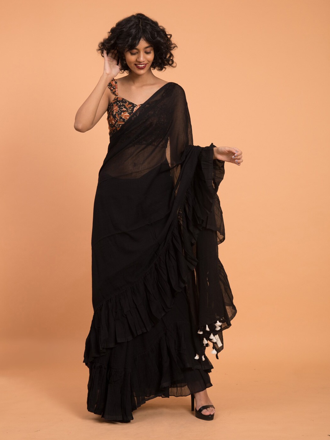 

Suta Black Pure Cotton Solid Ruffle Saree