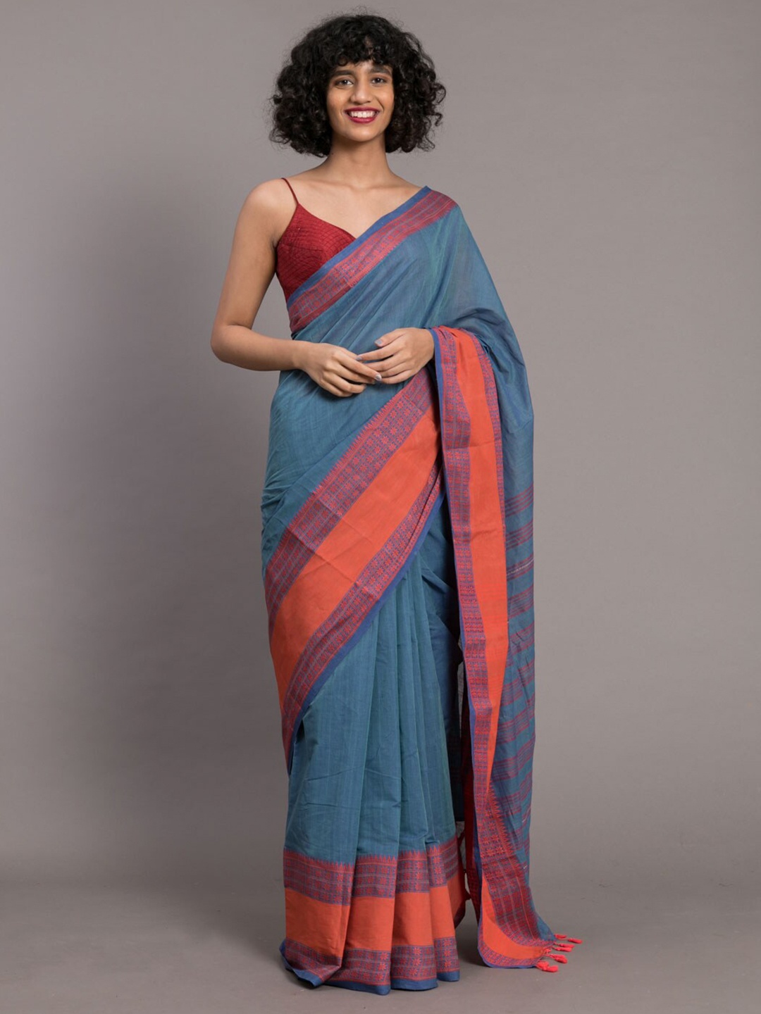 

Suta Blue & Red Floral Motifs Woven Pure Cotton Saree