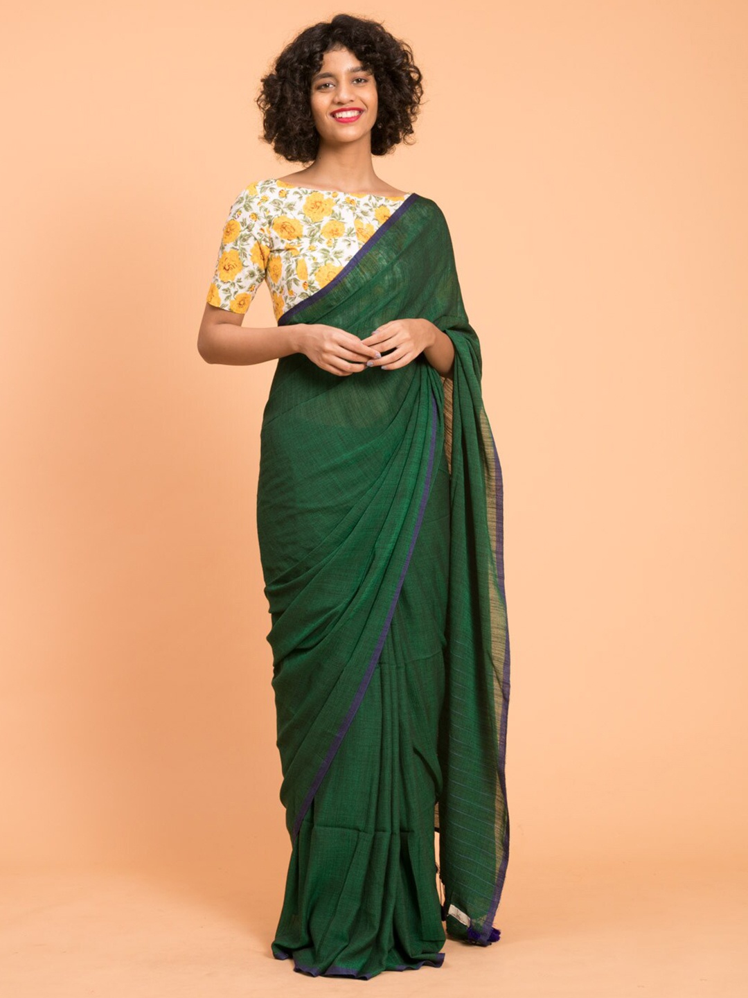

Suta Green & Blue Solid Cotton Saree