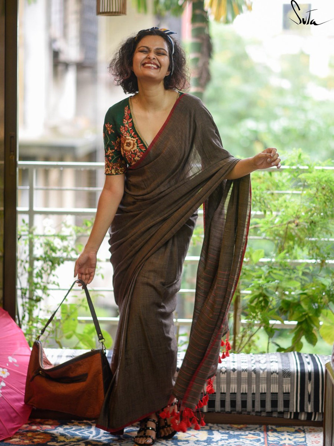 

Suta Brown & Red Solid Cotton Striped Saree