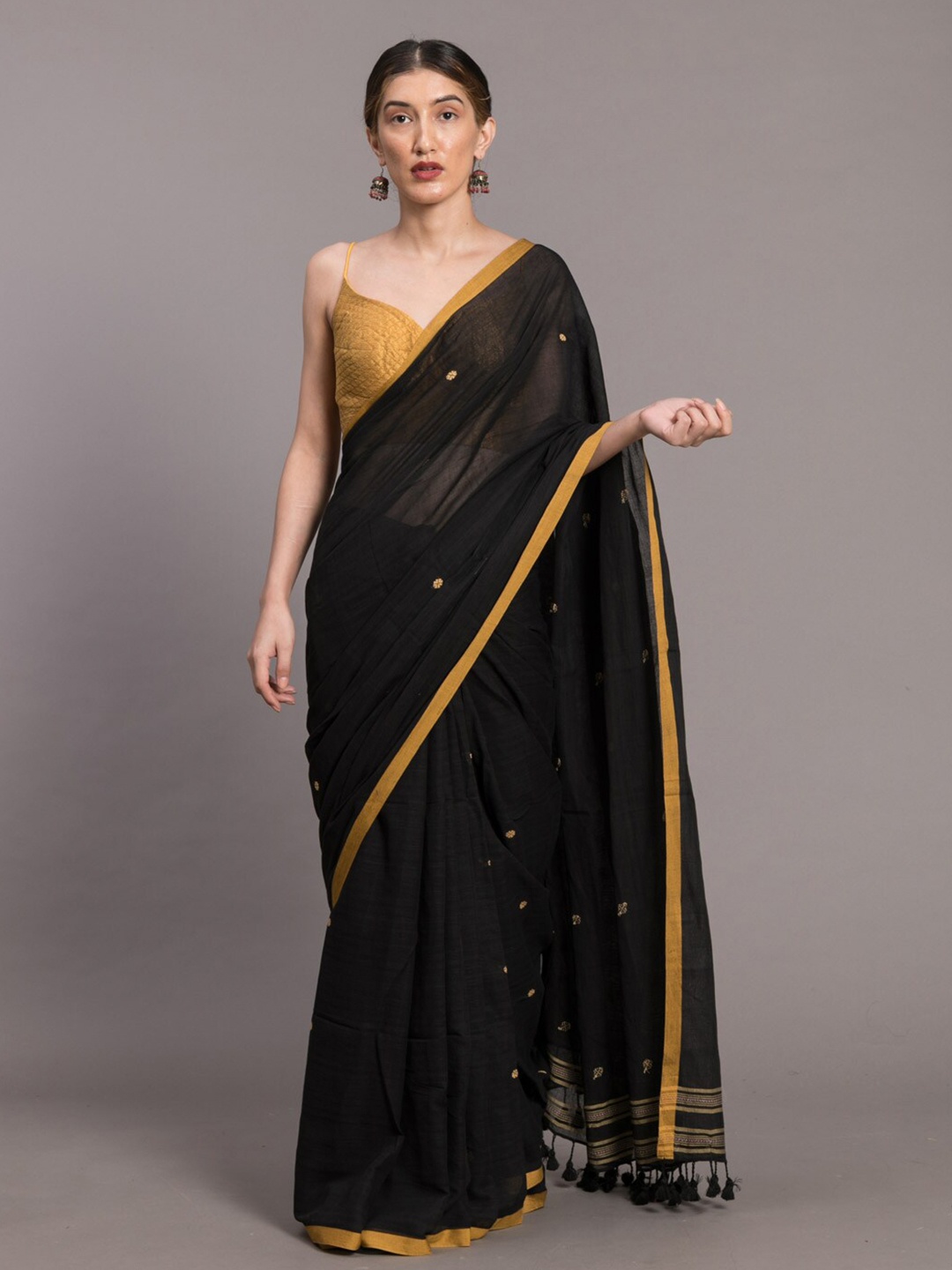

Suta Black & Yellow Floral Motifs Pure Cotton Saree