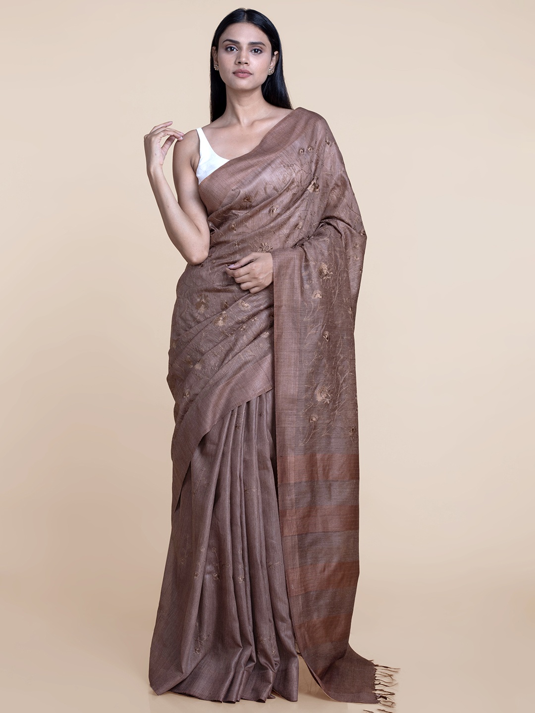 

Suta Brown Machine Embroidered Poly-Nylon Saree