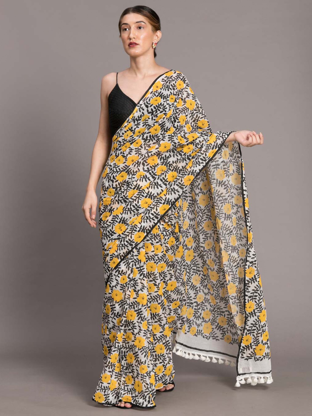 

Suta White & Yellow Floral Pure Cotton Saree