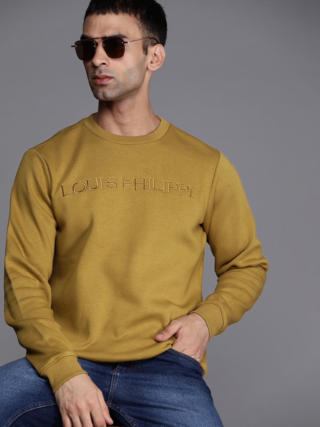 

Louis Philippe Men Mustard Sweatshirt