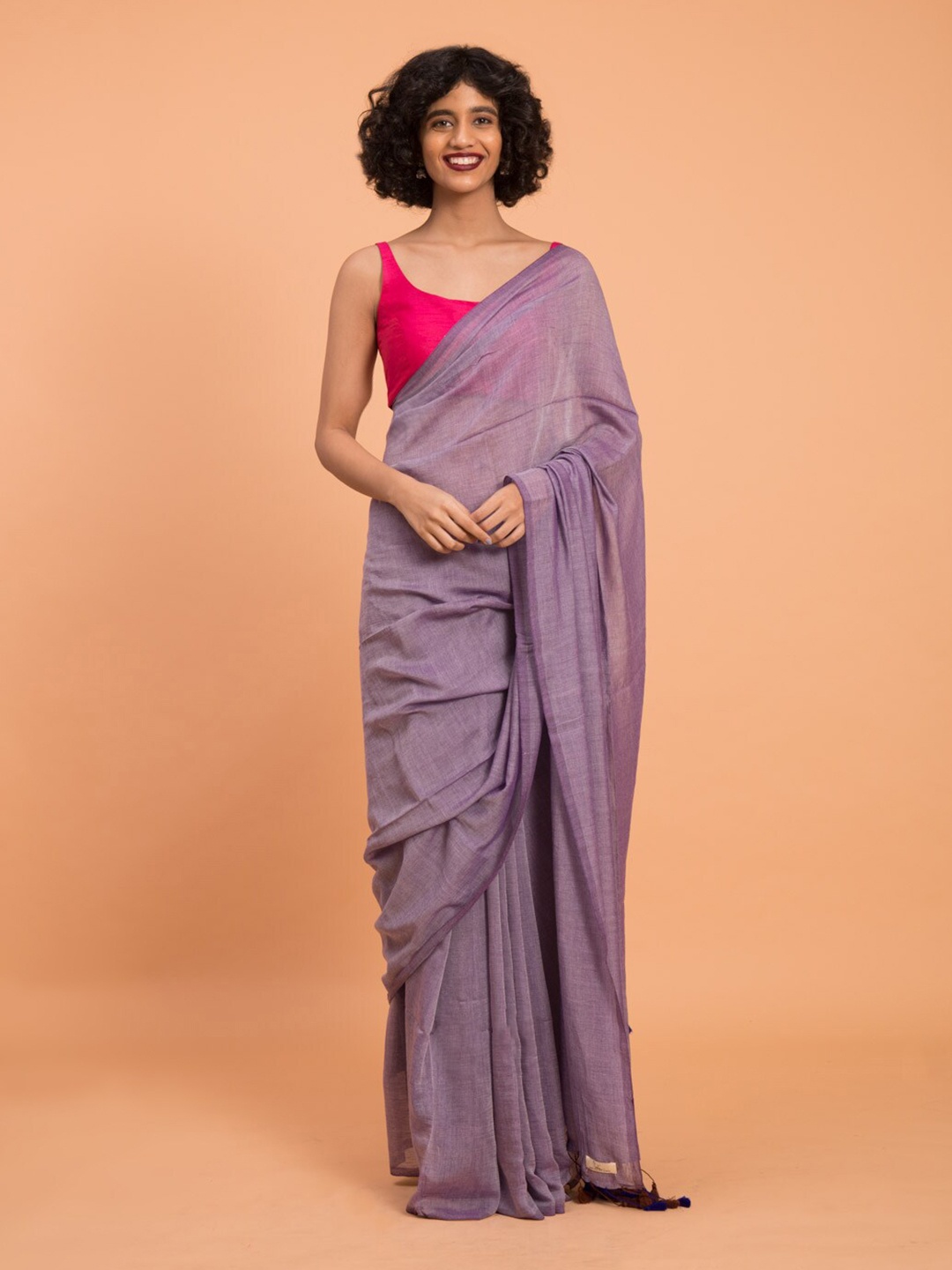 

Suta Lavender Solid Cotton Blend Saree