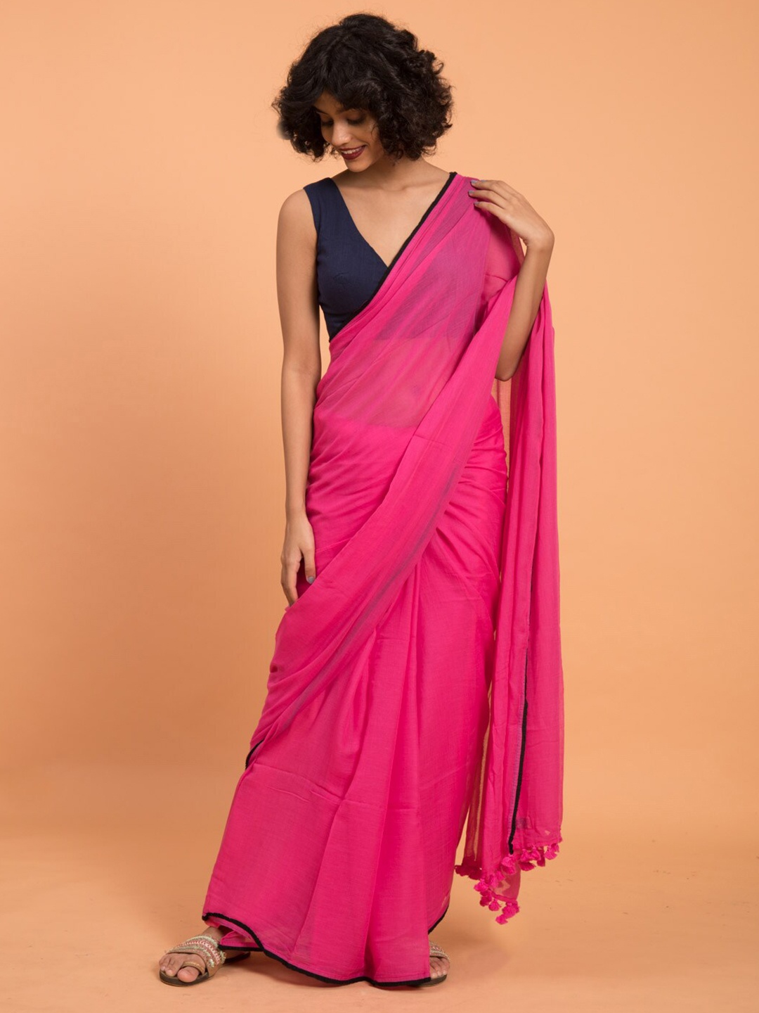 

Suta Women Pink Black Solid Cotton Saree with Tassels