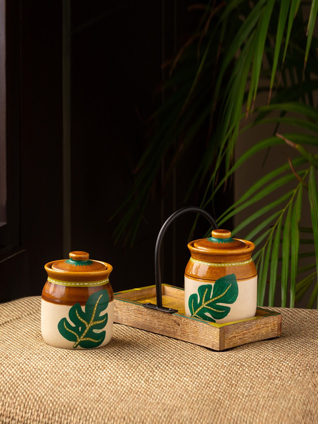 

ExclusiveLane Set Of 2 Shades of a Leaf Ceramic Jars With Lid Wooden Holder - 220 ml, Brown
