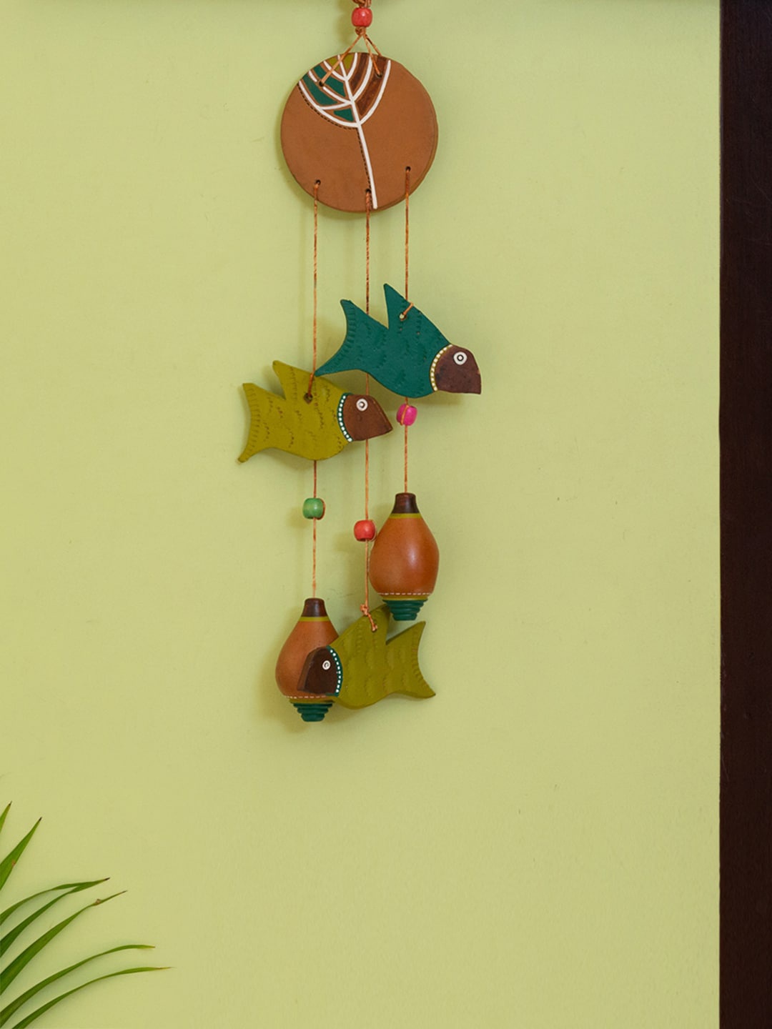 

ExclusiveLane Brown & Green Hand-Painted Terracotta Wind Chime