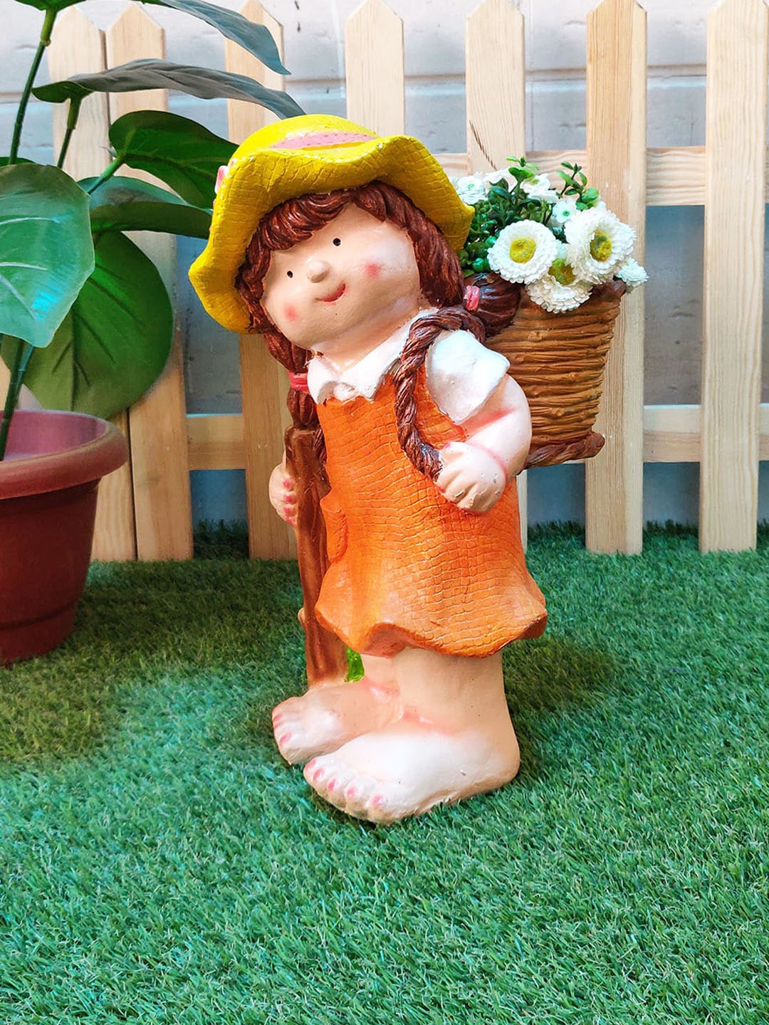 

Wonderland Girl With Pot on Back, Orange