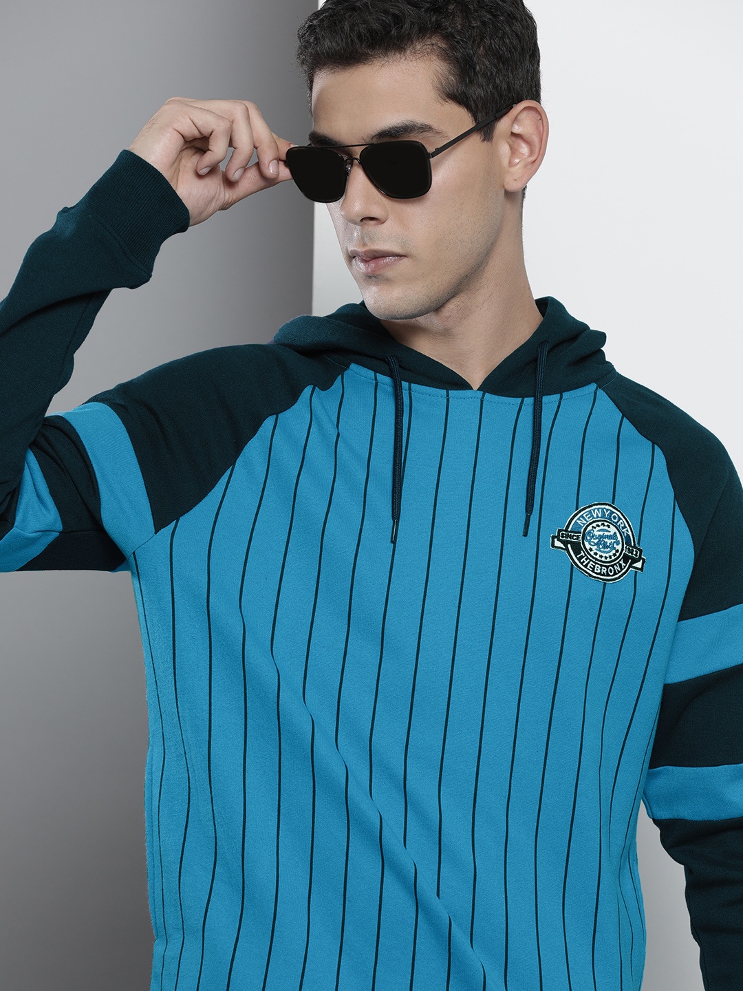 

The Indian Garage Co Men Blue Striped Hooded Sweatshirt