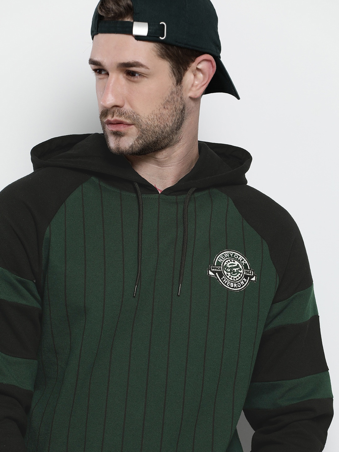 

The Indian Garage Co Men Green & Black Striped Hooded Sweatshirt
