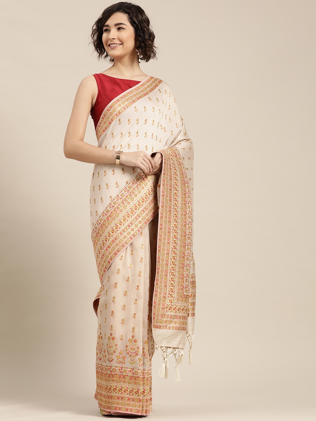 

Mitera Cream-Coloured Ethnic Motifs Embroidered Saree