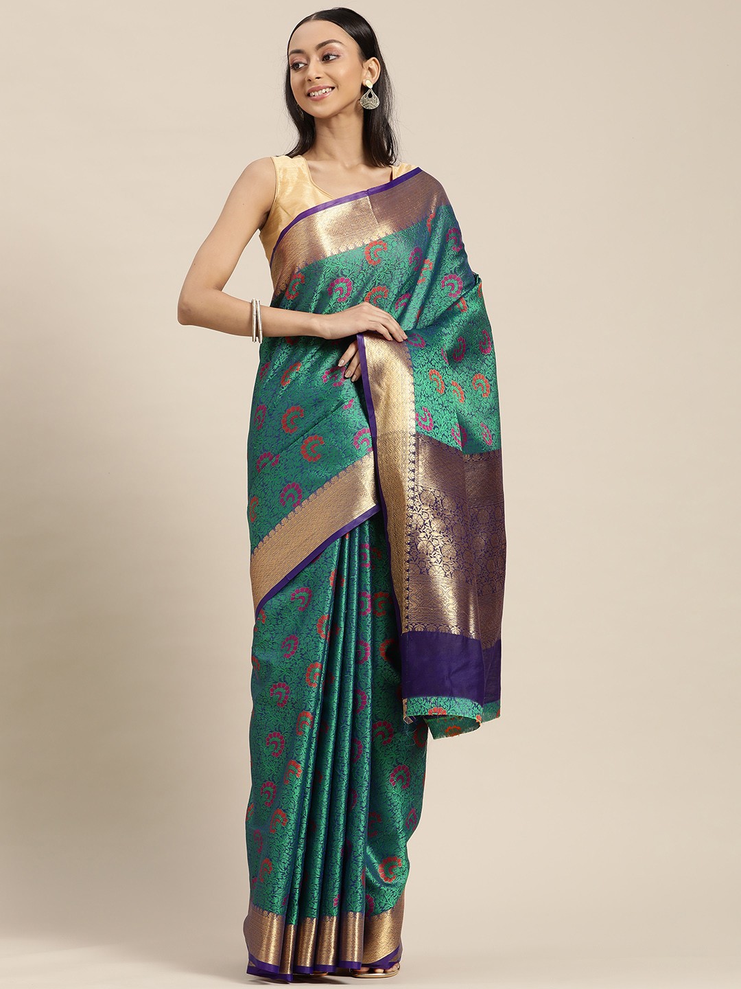 

Mitera Green & Blue Woven Design Zari Silk Blend Saree