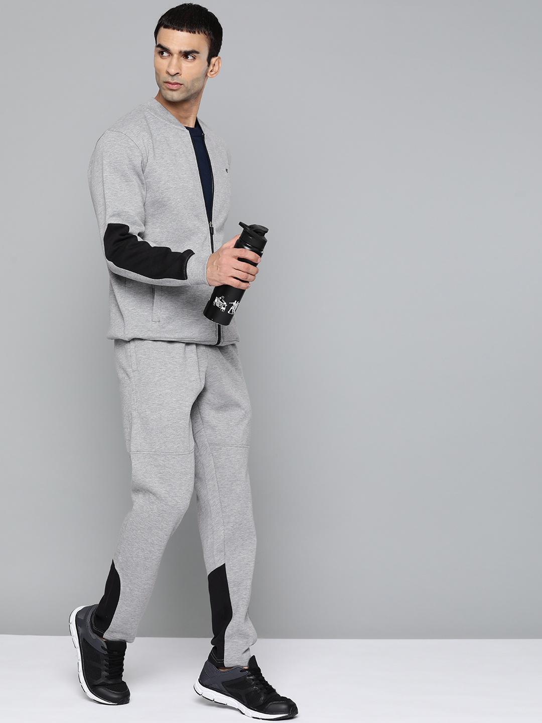 

Alcis Men Grey Melange & Black Solid Track Suits