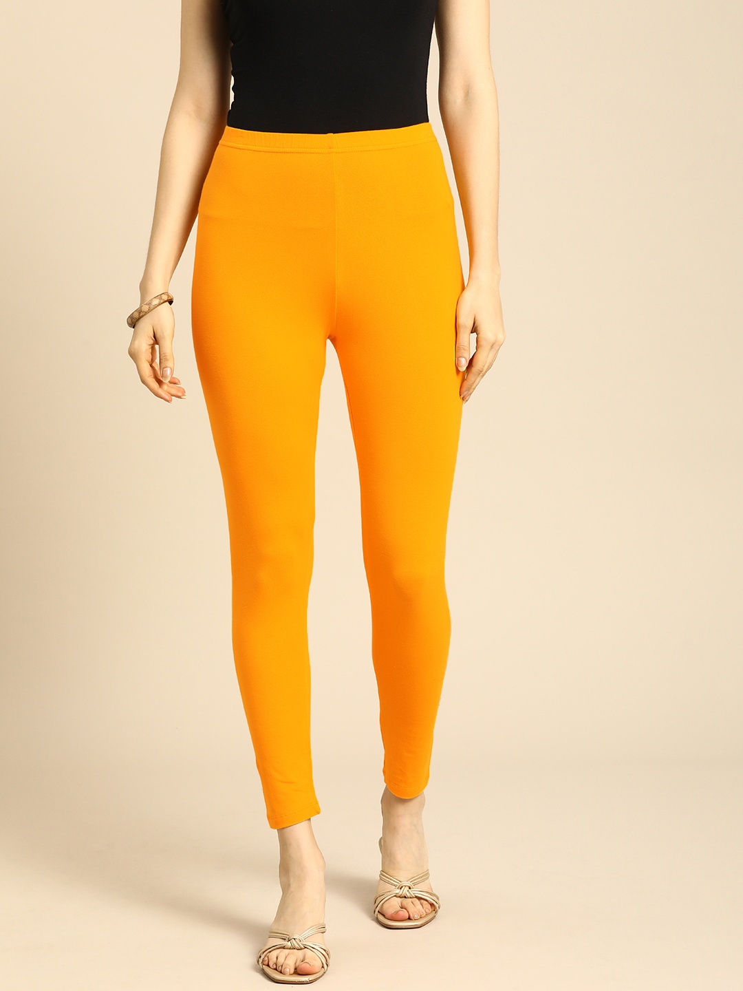 

Anouk Women Orange Solid Ankle Length Leggings