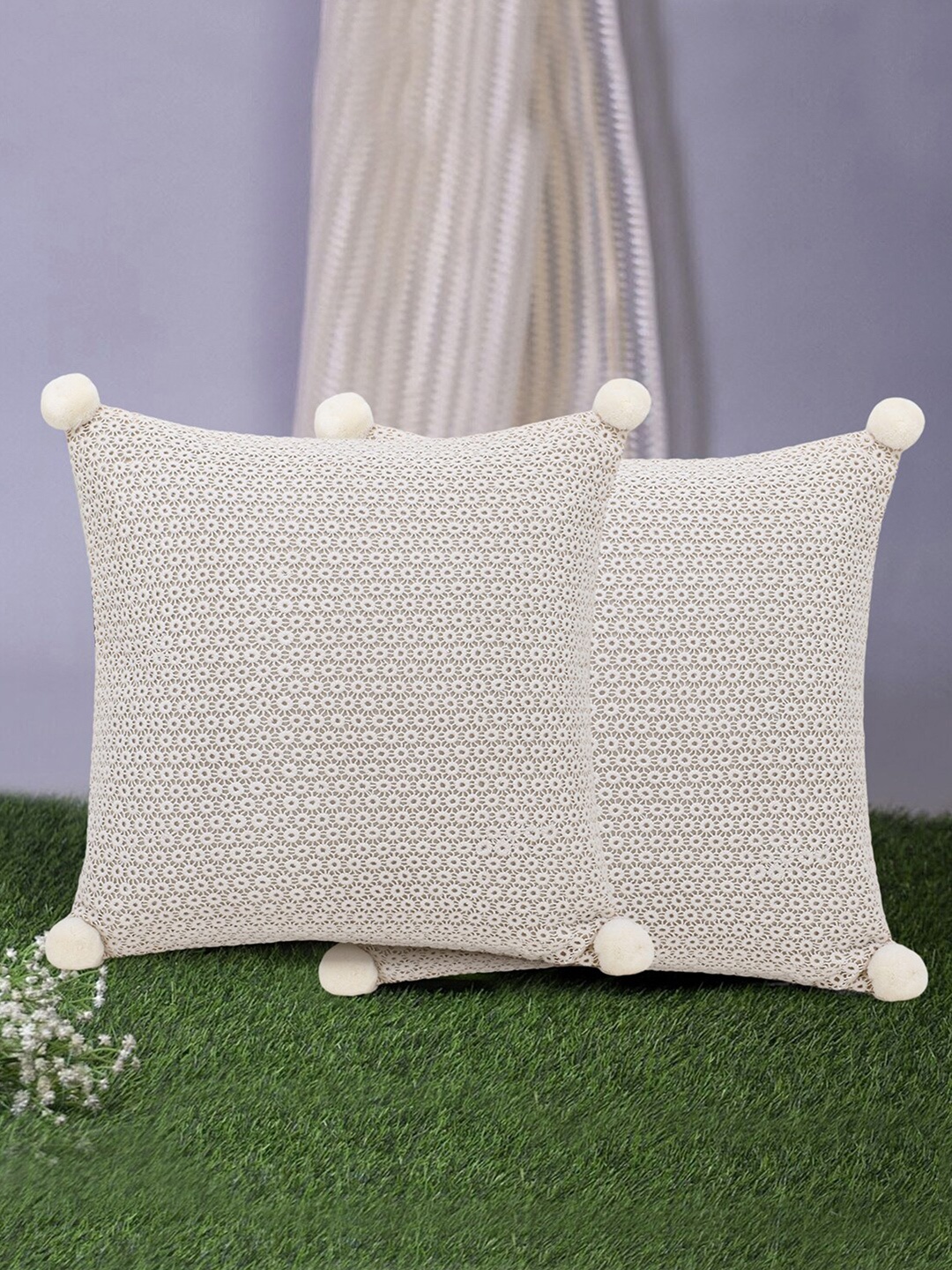 

Mezposh Set of 2 Off White & Grey Self Design Square Cushion Covers with Pompoms