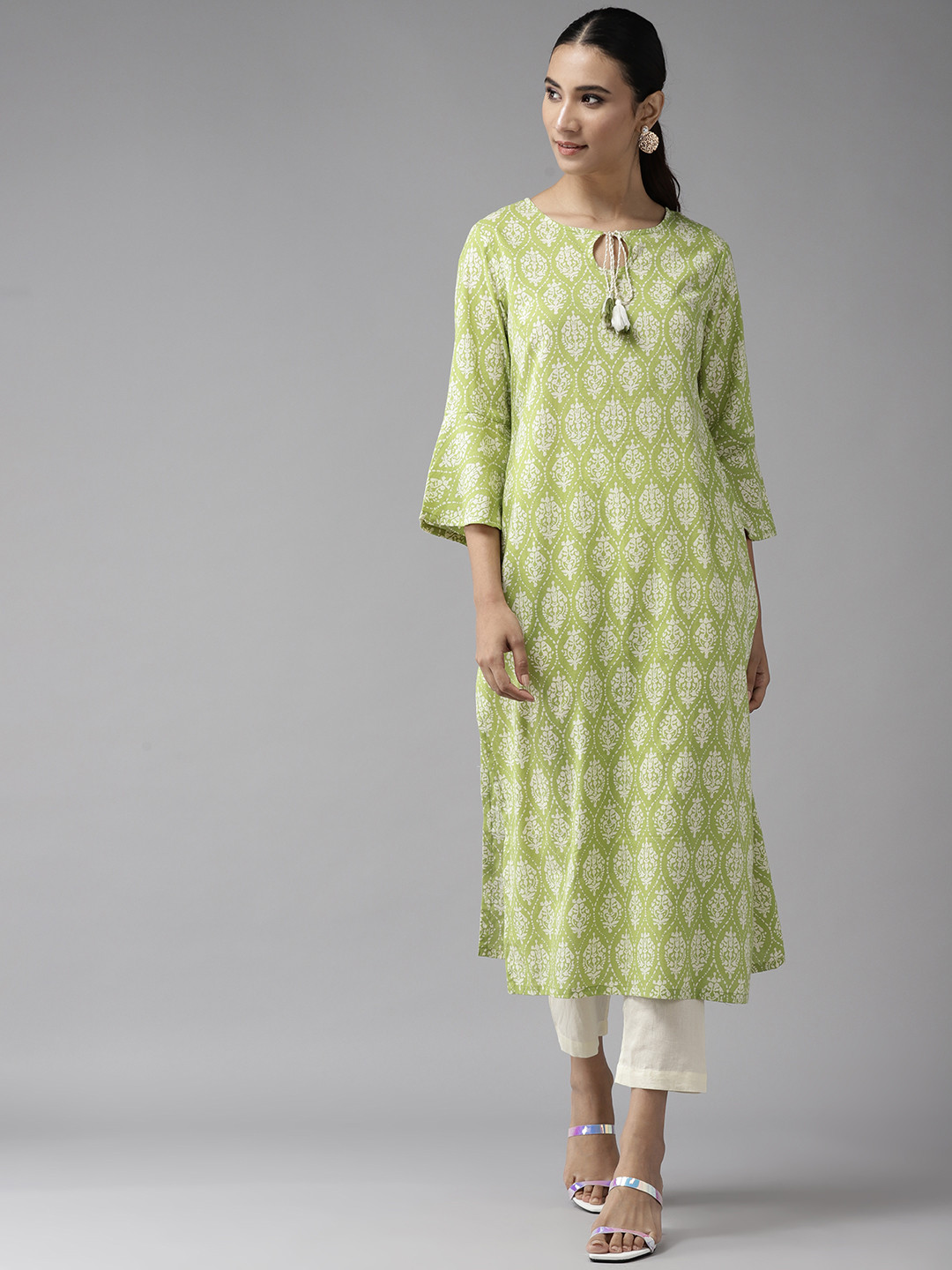 

Amirah s Women Green & Off-White Ethnic Motifs Printed Regular Kurta with Trousers
