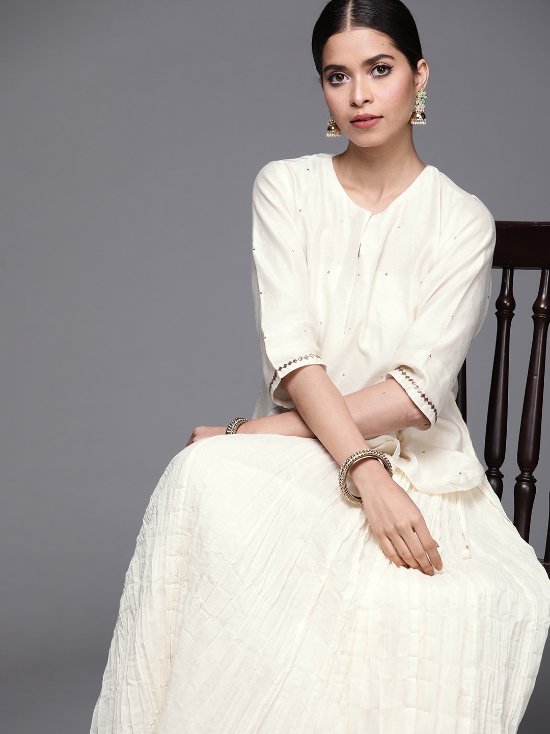 

Fabindia Women Cream-Coloured Solid Kurti with Skirt