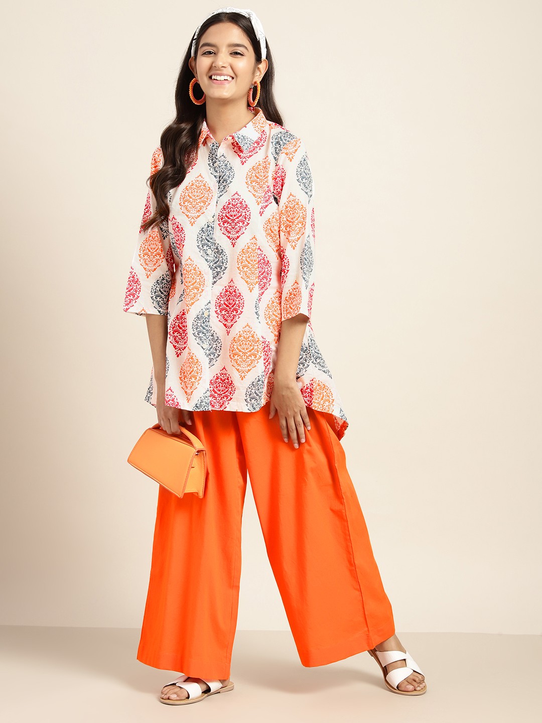 

Sangria Girls White & Orange Printed Shirt with Palazzos