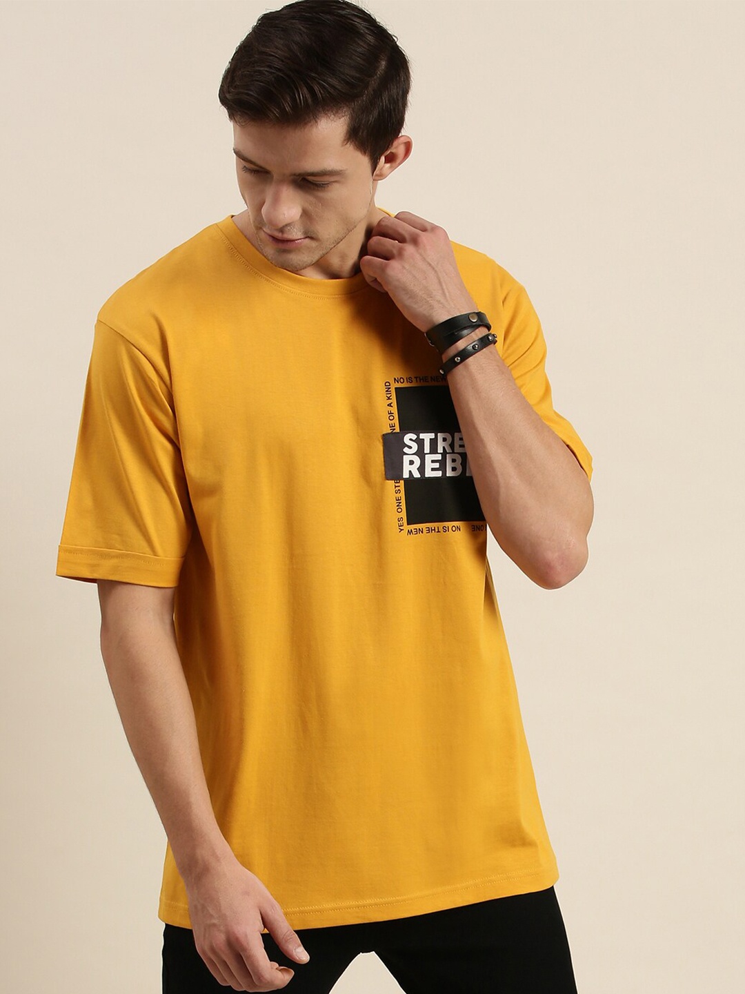 

Difference of Opinion Men Mustard Yellow Typography Applique Loose Fit Pure Cotton T-shirt