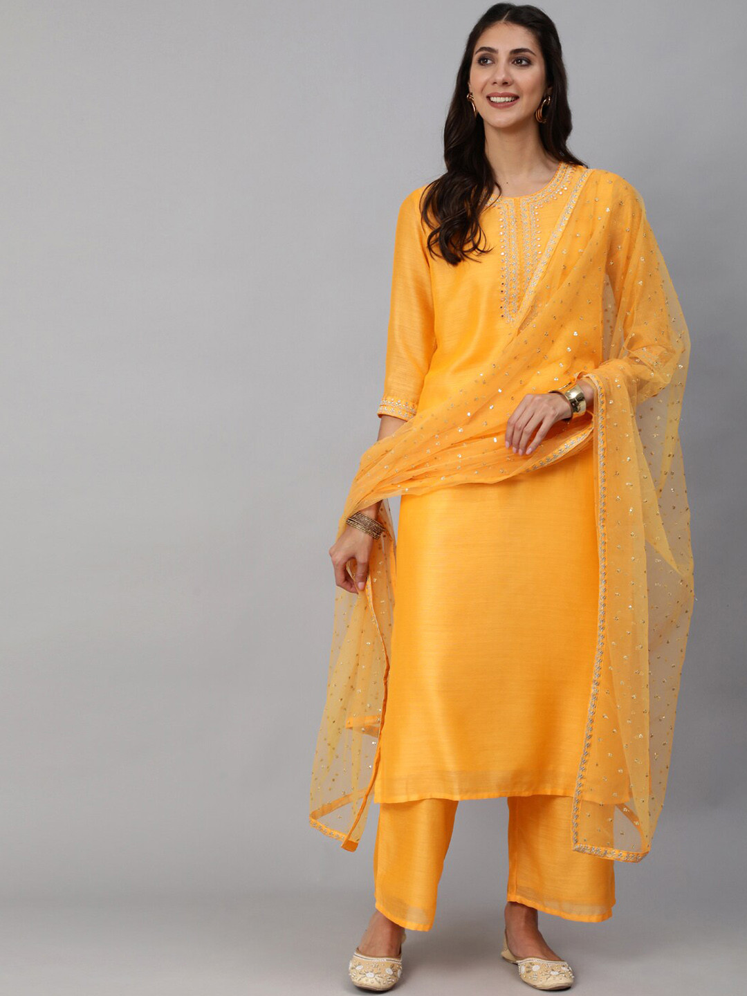 

Nayo Women Yellow Yoke Design Sequinned Chanderi Cotton Kurta with Palazzos & Dupatta