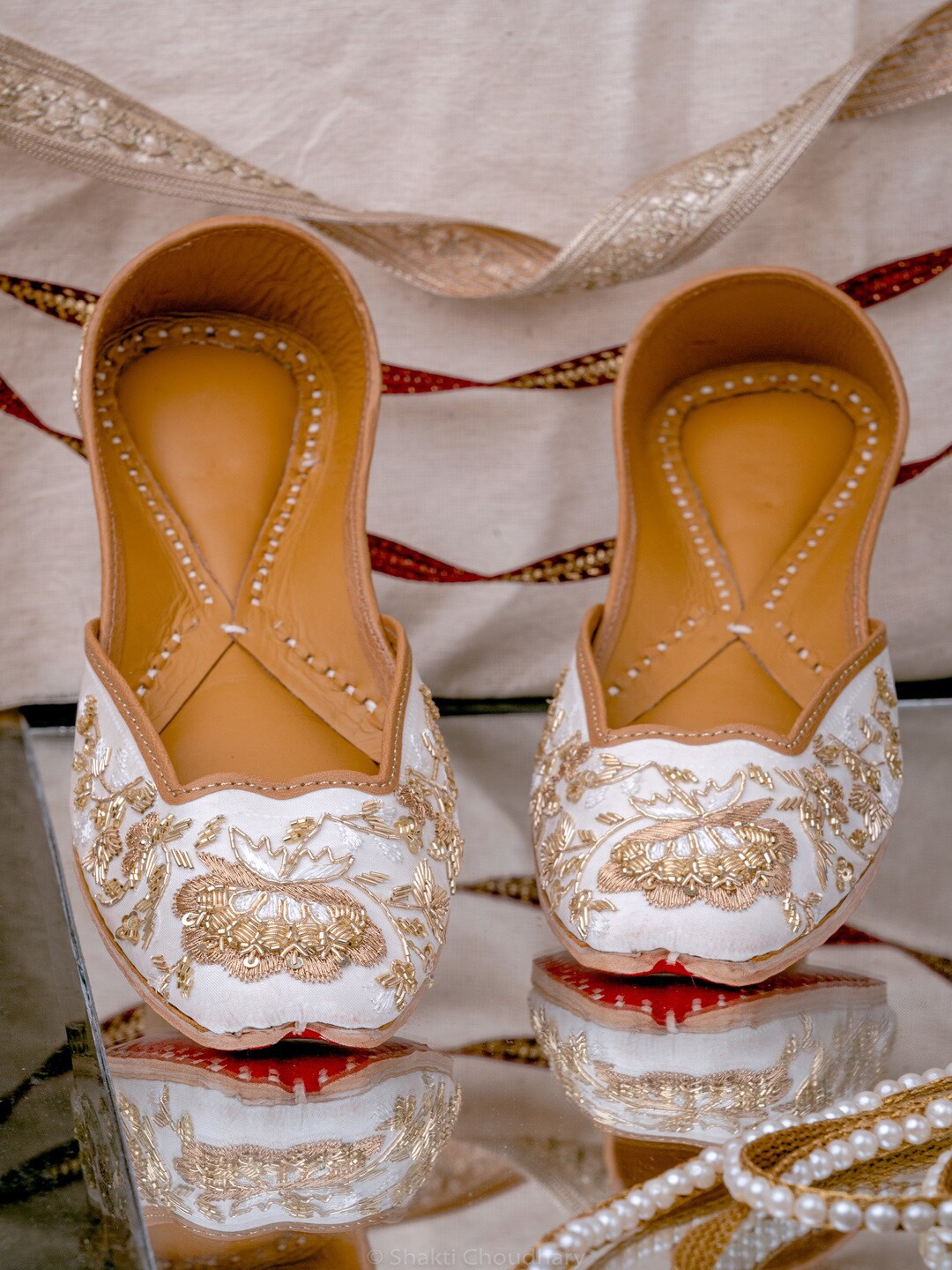 

NR By Nidhi Rathi Women White & Gold-Toned Hand Embroidered Leather Mojaris