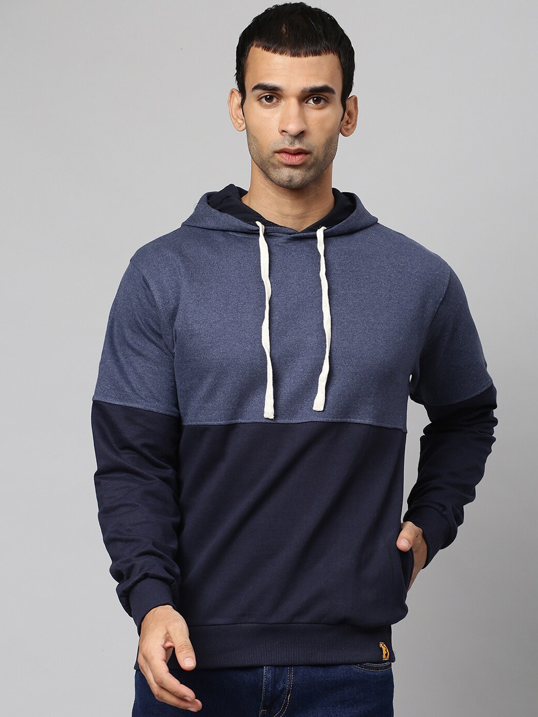 

Campus Sutra Men Blue Colourblocked Cotton Sweatshirt