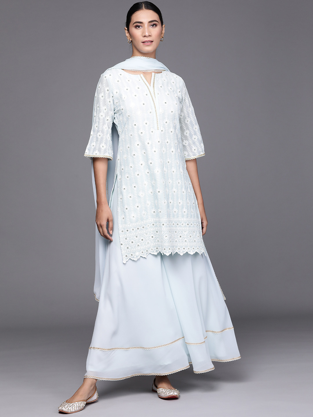 

Libas Women Blue & Off-White Ethnic Motifs Embroidered Kurta with Palazzos & Dupatta