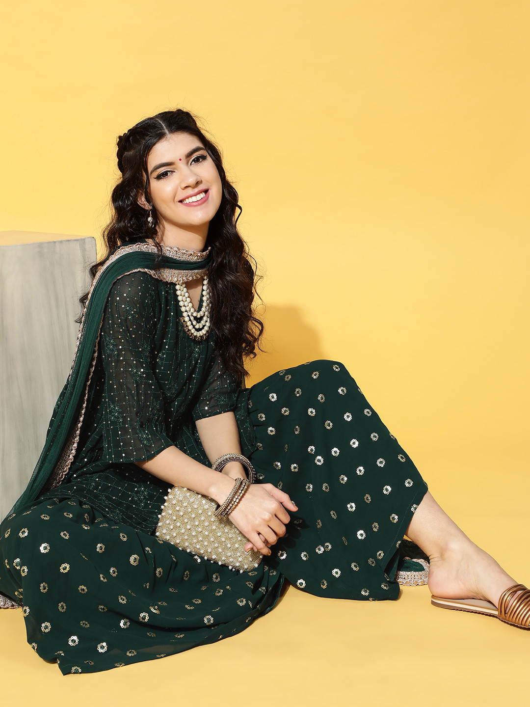 

Libas Women Green & Golden Ethnic Embroidered Sequinned Kurta with Sharara & Dupatta