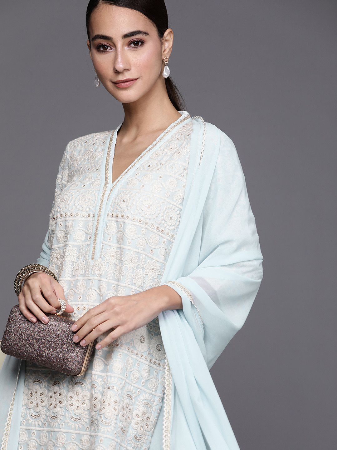 

Libas Women Blue & White Embroidered Regular Kurta with Palazzos & Dupatta