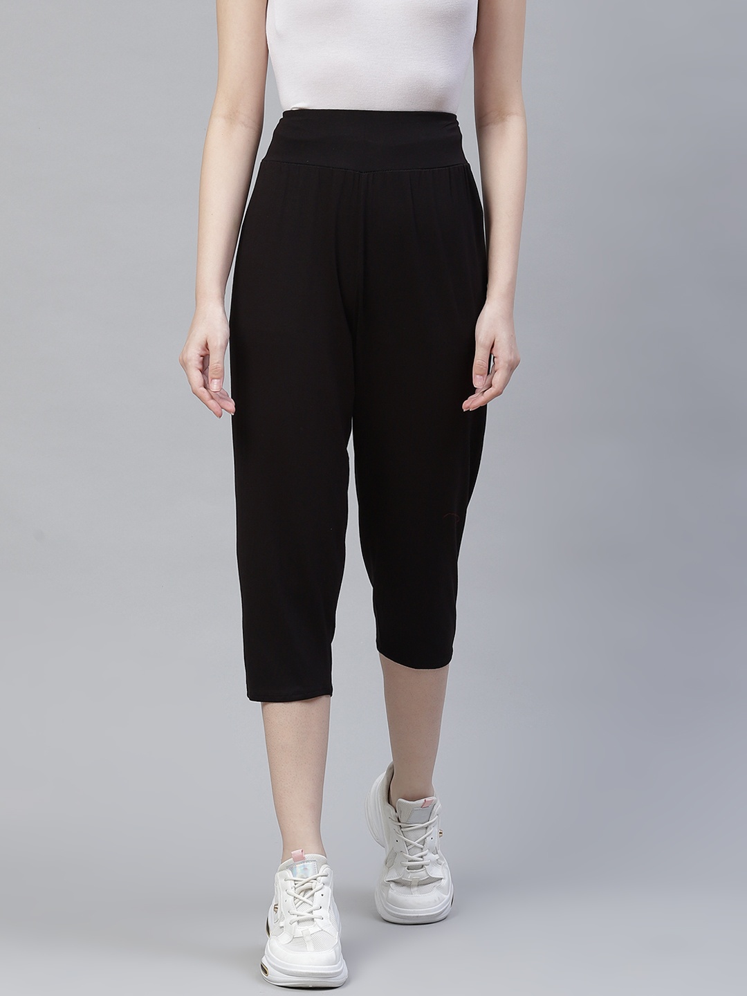 

Marks & Spencer Women Black Solid Capri Trackpants