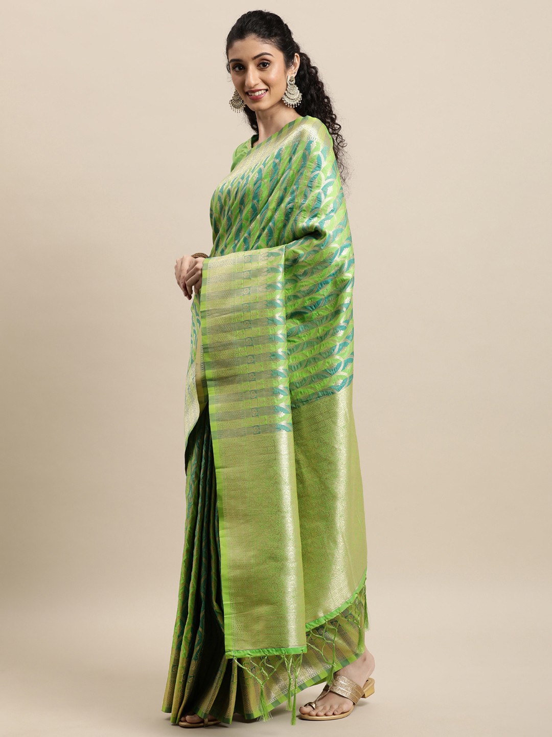 

Mitera Green Jacquard Striped Zari Banarasi Saree