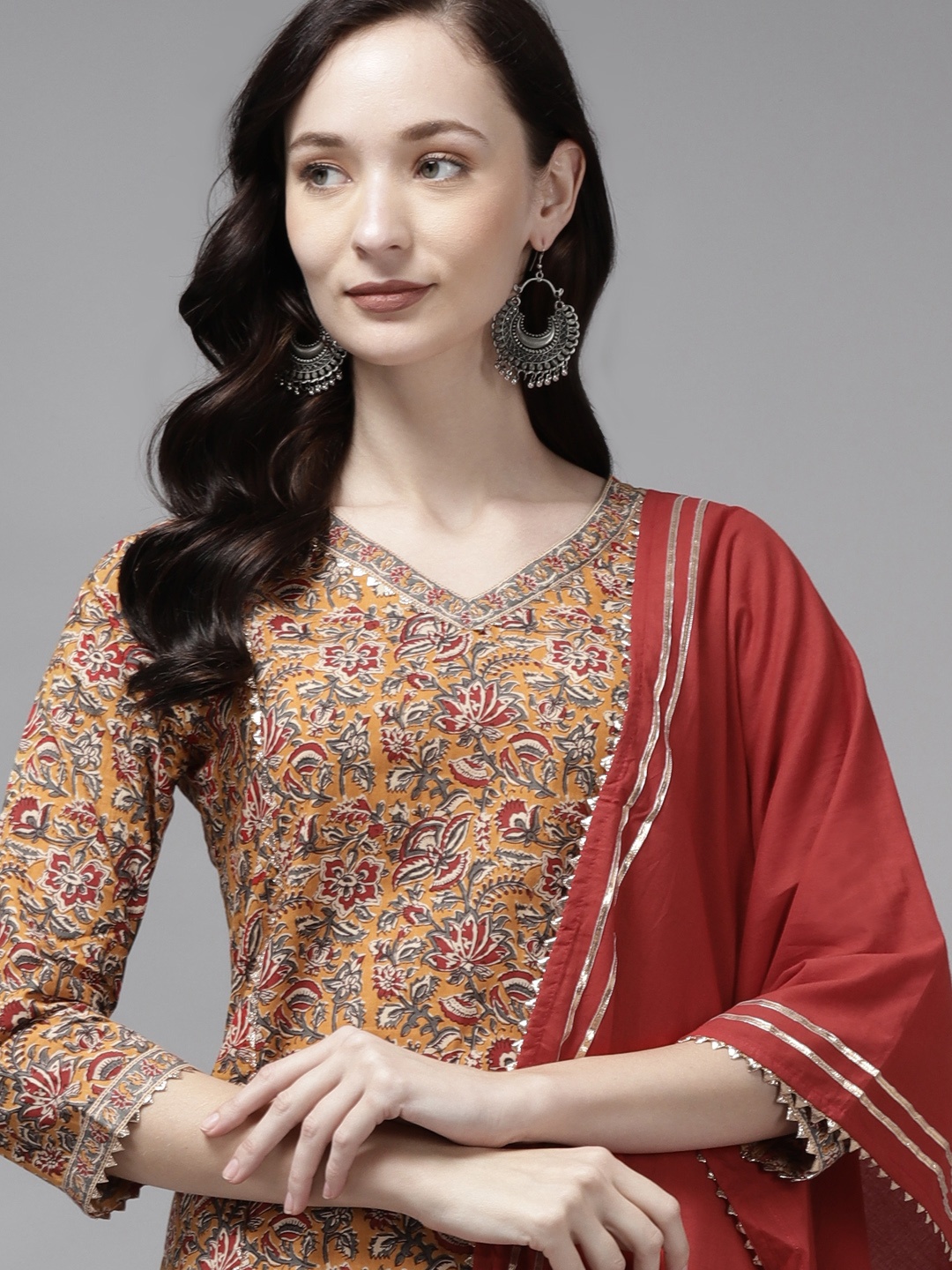 

Indo Era Women Mustard Orange & Red Printed Cotton Kurta with Palazzos & Dupatta