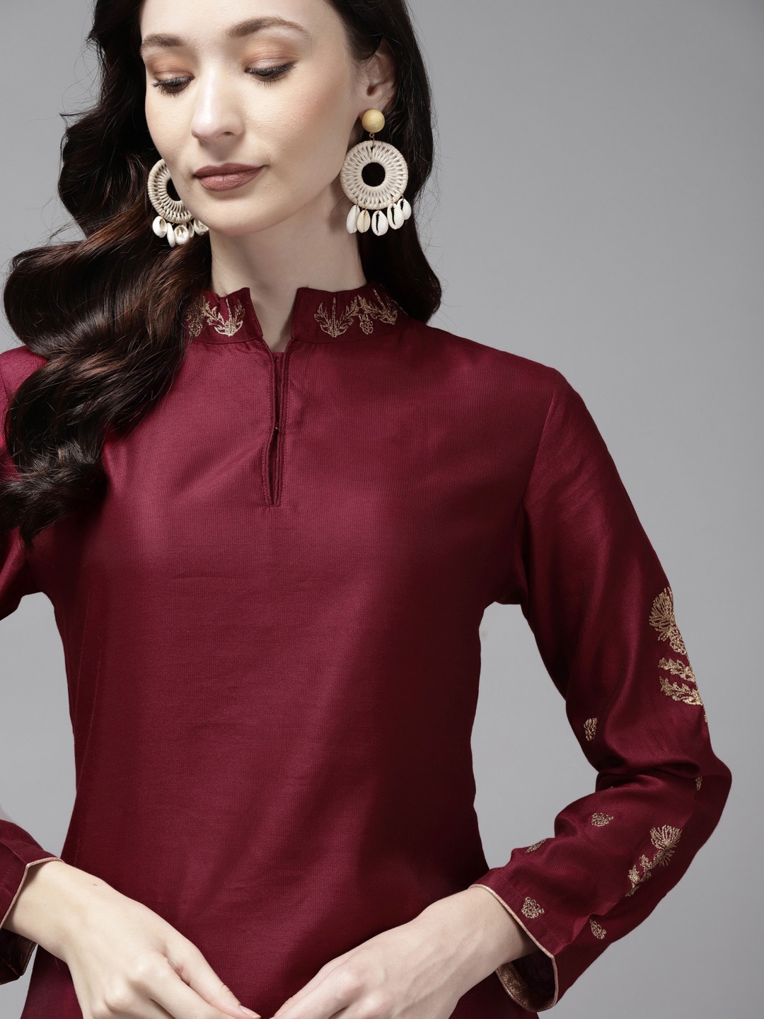 

Indo Era Women Maroon Solid Embroidered Regular Thread Work Kurta with Palazzos