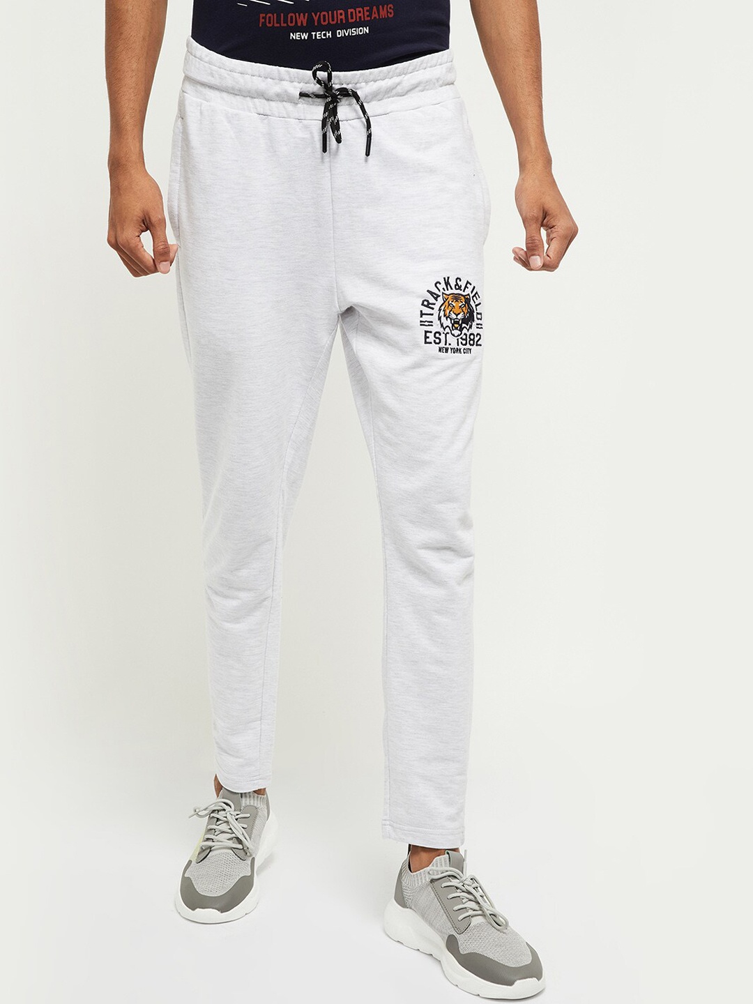 

max Men White Solid Track Pants