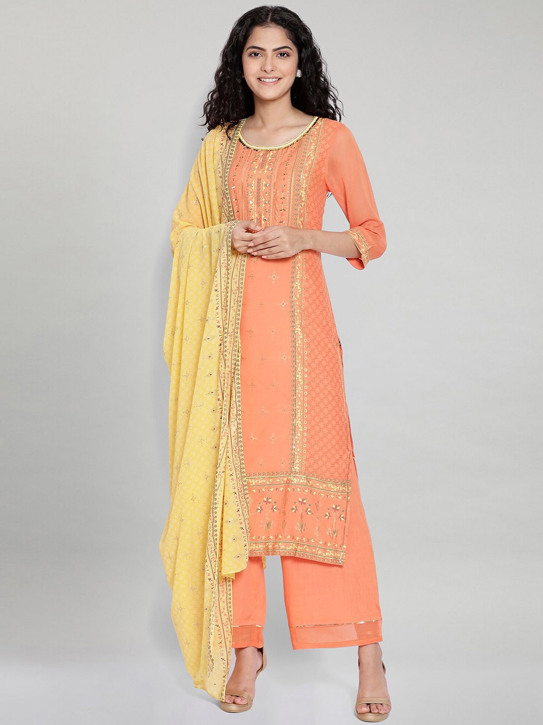 

AURELIA Women Orange Ethnic Motifs Printed Kurta with Palazzos & With Dupatta