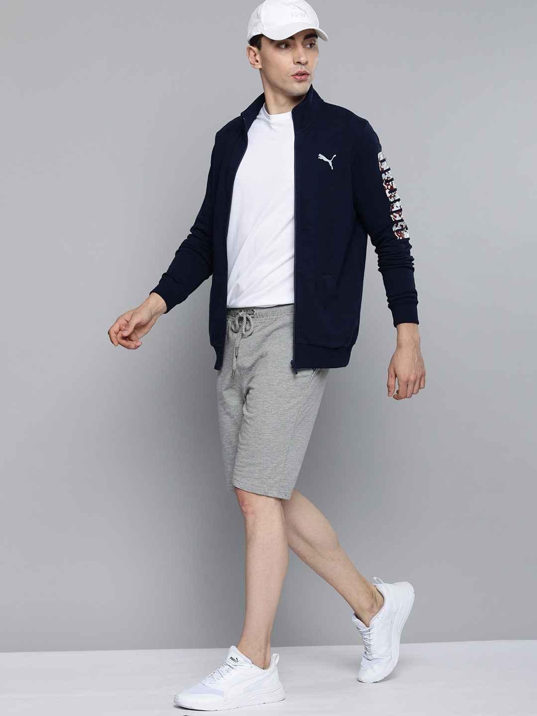 

Puma Men Navy Blue Printed Slim Fit Sporty Track Jacket