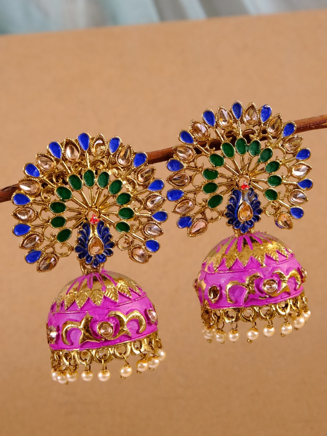 

Crunchy Fashion Gold Plated Purple Peacock Shaped Jhumkas Earrings