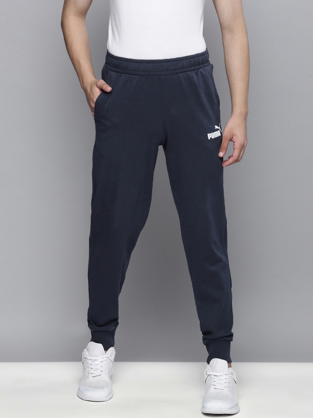 

Puma Men Black Solid ESS Jersey Track Pants, Navy blue