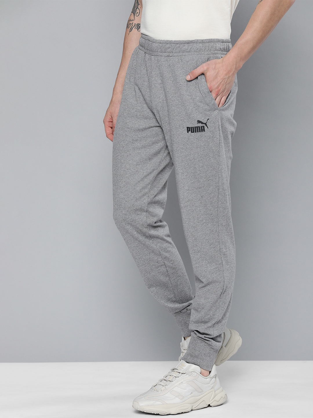 

Puma Men Grey Logo Printed Pure Cotton ESS Regular Jersey Joggers