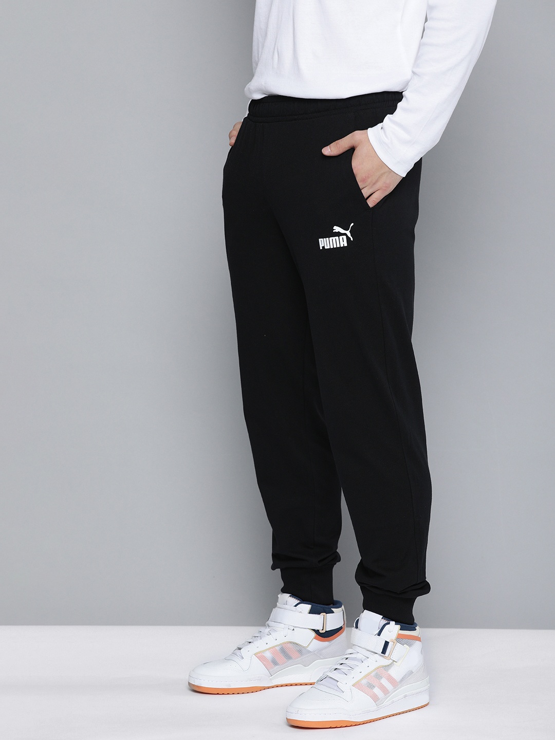 

Puma Men Black Ess Printed Regular Jersey Joggers