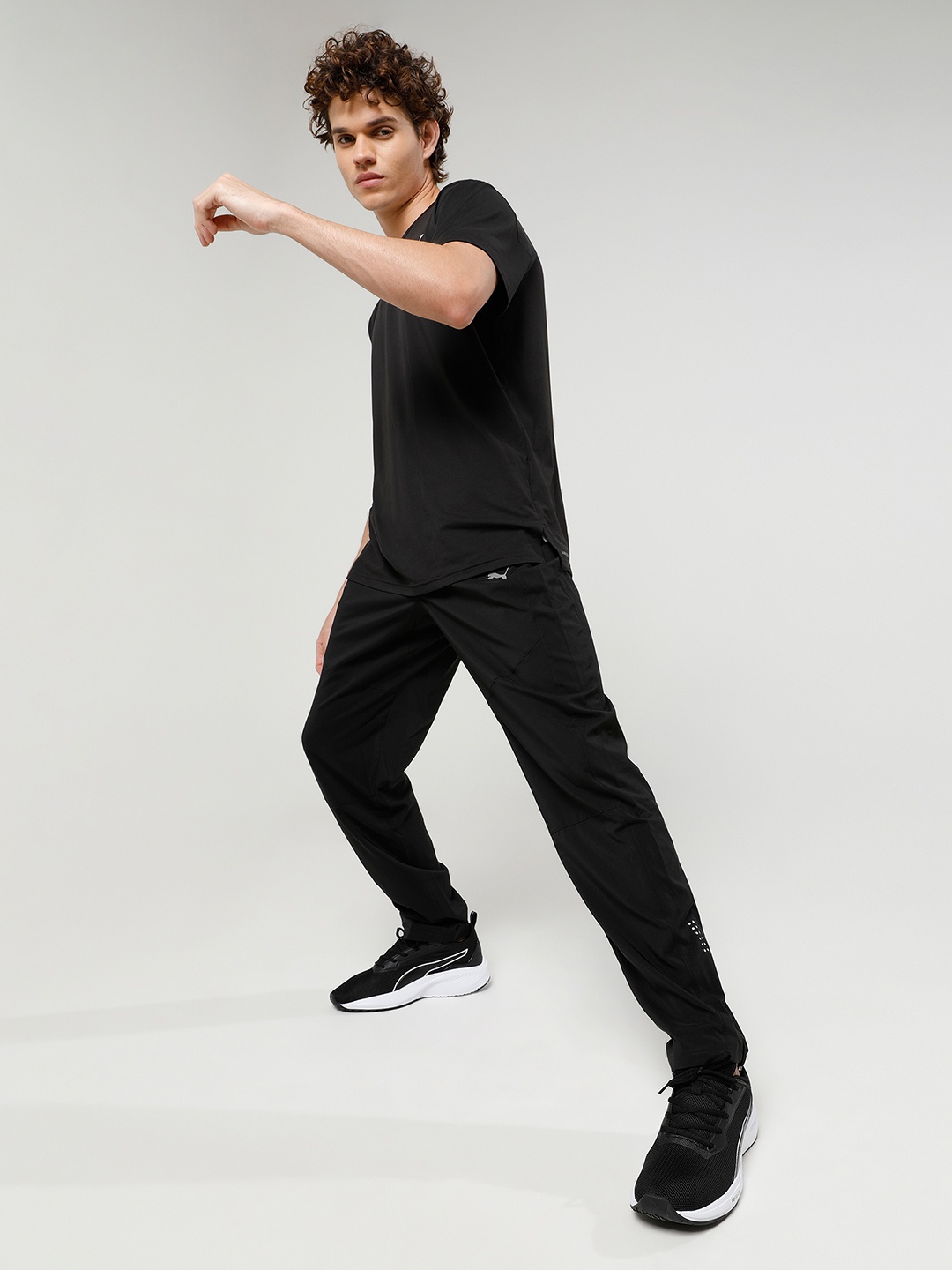 

Puma Men Black Solid Tapered Woven Track Pants