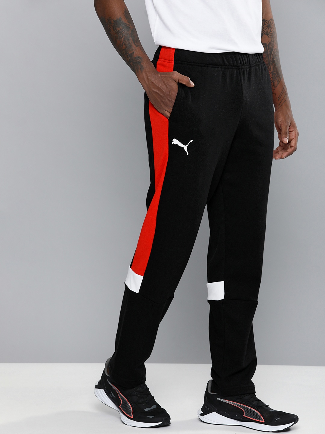 

Puma Men Colourblocked RCB Knitted Regular Fit Track Pants, Black