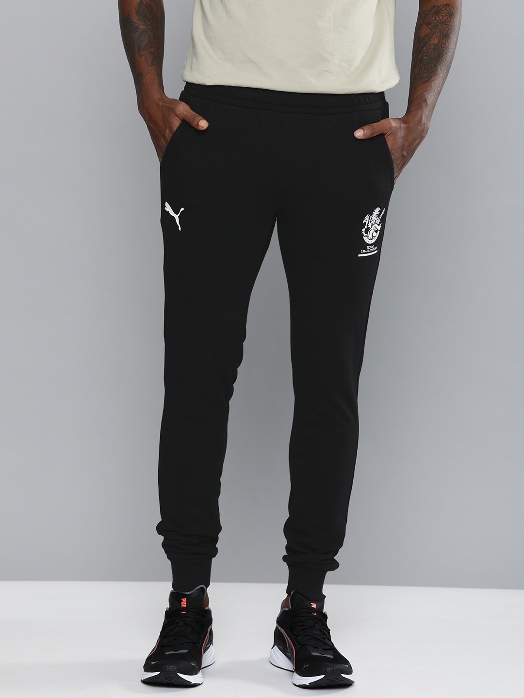 

Puma Men Black & White Graphic Printed Slim Fit RCB Knitted Joggers